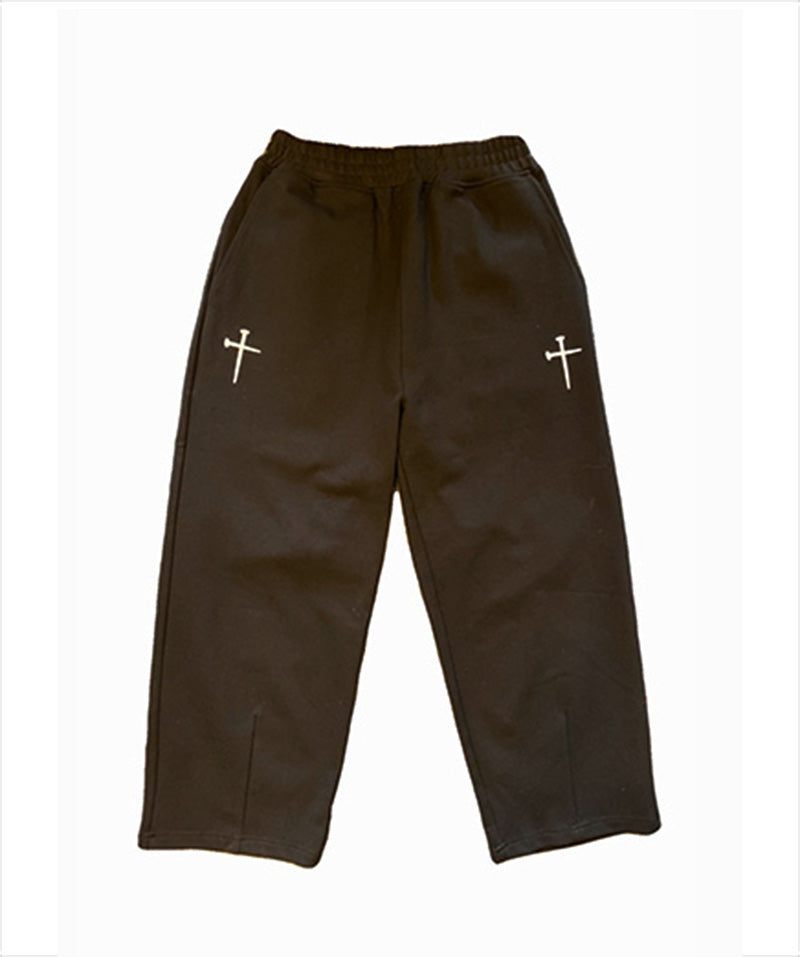 CROSS PANTS cross-embroidered pants 
